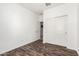 Bedroom with sliding closet doors at 17532 W Copper Ridge Dr, Goodyear, AZ 85338