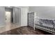 Bedroom with closet and crib at 17532 W Copper Ridge Dr, Goodyear, AZ 85338