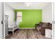 Bedroom with crib and window at 17532 W Copper Ridge Dr, Goodyear, AZ 85338