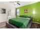 Bedroom features include a ceiling fan, and an attached bathroom at 17532 W Copper Ridge Dr, Goodyear, AZ 85338