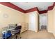 Bedroom showcasing a desk, dresser, and neutral-colored walls at 18171 W Marshall Ln, Surprise, AZ 85388