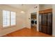 Eat-in kitchen area with stainless steel refrigerator and bright natural light at 1821 N 74Th Pl, Mesa, AZ 85207