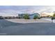 Charming single-story home with desert landscaping, curved driveway, and mature trees at 19029 E Mary Ann Way, Queen Creek, AZ 85142
