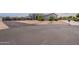 Charming single-story home with a well-maintained desert landscaped front yard and a long driveway at 19029 E Mary Ann Way, Queen Creek, AZ 85142