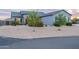 Beautiful desert home with meticulous desert landscaping, dark trim and stone accents at 19029 E Mary Ann Way, Queen Creek, AZ 85142
