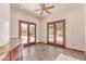 The living room features double doors that open to the backyard and pool at 1954 N Calle Maderas --, Mesa, AZ 85213