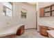 Bright office features built-in cabinets and curved countertops at 1954 N Calle Maderas --, Mesa, AZ 85213