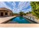 Inviting swimming pool with lush landscaping and a tranquil atmosphere, ideal for leisure and enjoyment at 1954 N Calle Maderas --, Mesa, AZ 85213