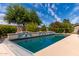 Sparkling pool with decorative tile accents provides a refreshing oasis in a serene backyard setting at 1954 N Calle Maderas --, Mesa, AZ 85213