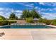 Serene pool with decorative tiled wall, offering a tranquil and picturesque backyard retreat at 1954 N Calle Maderas --, Mesa, AZ 85213