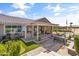 Spacious backyard featuring a covered patio, built-in grill, and putting green for outdoor enjoyment at 20426 N Blazing Sun Rd, Maricopa, AZ 85138