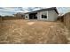 Spacious backyard with block fencing and ample space for landscaping and outdoor entertaining at 22709 E Saddle Way, Queen Creek, AZ 85142