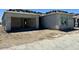 New construction home featuring an attached two-car garage and neutral stucco exterior at 22709 E Saddle Way, Queen Creek, AZ 85142