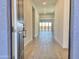 Inviting entry hallway featuring tile floors leading to an open living space at 22709 E Saddle Way, Queen Creek, AZ 85142