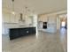 Bright kitchen featuring an island, stainless appliances, and ample cabinet space at 22709 E Saddle Way, Queen Creek, AZ 85142