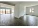 Spacious living room seamlessly flows into the kitchen, perfect for modern living and entertaining at 22709 E Saddle Way, Queen Creek, AZ 85142
