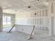 Living room view of new construction with drywall, framing, and window at 22709 E Saddle Way, Queen Creek, AZ 85142