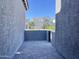 Private patio with gray brick floor provides a cozy outdoor space at 22709 E Saddle Way, Queen Creek, AZ 85142