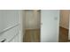 Bright walk-in closet boasts ample storage with shelves and clothing rods, perfect for organization and space saving at 22709 E Saddle Way, Queen Creek, AZ 85142