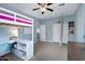 Bedroom with carpet, closet, bunk beds, and a bright window at 2496 E Lindrick Dr, Gilbert, AZ 85298