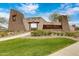 Stone monument and sign at the entrance to the Adora Trails community at 2496 E Lindrick Dr, Gilbert, AZ 85298