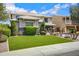 Attractive home with neat landscaping, artificial turf, and charming curb appeal on a sunny day at 2496 E Lindrick Dr, Gilbert, AZ 85298