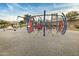 Community playground with unique climbing features and shade structures offers a fun place for to play at 2496 E Lindrick Dr, Gilbert, AZ 85298