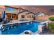Beautiful backyard with a sparkling pool and patio, perfect for outdoor entertaining at 2607 W Gray Wolf Trl, Phoenix, AZ 85085