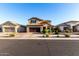 Beautiful two-story home featuring a landscaped front yard, brown garage door, and inviting curb appeal at 2607 W Gray Wolf Trl, Phoenix, AZ 85085