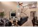 Inviting living room with a cozy seating area, high ceilings, and clerestory windows for ample natural light at 2607 W Gray Wolf Trl, Phoenix, AZ 85085