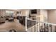 Loft with carpet, sitting area, and view of the dining room at 2607 W Gray Wolf Trl, Phoenix, AZ 85085