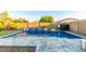 Refreshing backyard pool with waterfall feature and a well-maintained patio, perfect for relaxing and entertaining at 2607 W Gray Wolf Trl, Phoenix, AZ 85085