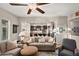 Spacious living room seamlessly connected to the kitchen, perfect for entertaining guests at 27276 N 81St Ln, Peoria, AZ 85383