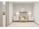 Inviting Bedroom featuring a round crib, soft lighting, stylish decor, and light neutral walls at 3114 S 155Th Ln, Goodyear, AZ 85338