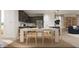 Stylish kitchen and dining area with a large dining table, ideal for Gathering meals and gatherings at 3114 S 155Th Ln, Goodyear, AZ 85338