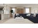 Bright and airy living room with a comfortable sectional sofa and stylish decor, ideal for entertaining at 3114 S 155Th Ln, Goodyear, AZ 85338