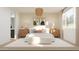 Serene main bedroom featuring natural light, a cozy bed, and elegant furnishings, ideal for relaxation at 3114 S 155Th Ln, Goodyear, AZ 85338