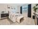 Cozy bedroom with soft carpet, a bench at the foot of the bed, and stylish decor at 3254 E Ranchhand Dr, San Tan Valley, AZ 85140