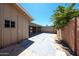 Backyard space with ample space for activities and gardening, plus a covered patio area at 3513 W Maryland Ave, Phoenix, AZ 85019