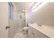 Tidy bathroom featuring a vanity, toilet and enclosed walk-in shower at 3513 W Maryland Ave, Phoenix, AZ 85019