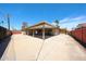 An outdoor carport offers ample space for parking vehicles and storage at 3513 W Maryland Ave, Phoenix, AZ 85019