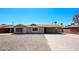 Inviting single-story home featuring a covered parking area and low maintenance landscaping at 3513 W Maryland Ave, Phoenix, AZ 85019