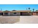 Charming single-story home with a covered carport and low-maintenance desert front yard at 3513 W Maryland Ave, Phoenix, AZ 85019