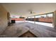 Spacious covered patio with ceiling fans, perfect for outdoor entertaining and relaxing in the backyard at 3513 W Maryland Ave, Phoenix, AZ 85019