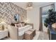 Cozy bedroom with peach accent wall, decorative wallpaper, and stylish bed at 3752 E Terrel St, San Tan Valley, AZ 85143