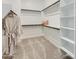 Walk-in closet featuring custom shelving and ample storage space at 3752 E Terrel St, San Tan Valley, AZ 85143