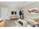 Cozy living room with modern decor, neutral tones, and bright, natural light at 3752 E Terrel St, San Tan Valley, AZ 85143