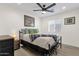 Comfortable bedroom featuring wood-look floors and a contemporary ceiling fan at 3806 N 23Rd Ave, Phoenix, AZ 85015