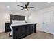 Spacious bedroom with a king-size bed, ceiling fan, and neutral color scheme at 3806 N 23Rd Ave, Phoenix, AZ 85015