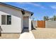 A charming single-Gathering home with a well-maintained exterior featuring a walkway to the front door at 3806 N 23Rd Ave, Phoenix, AZ 85015